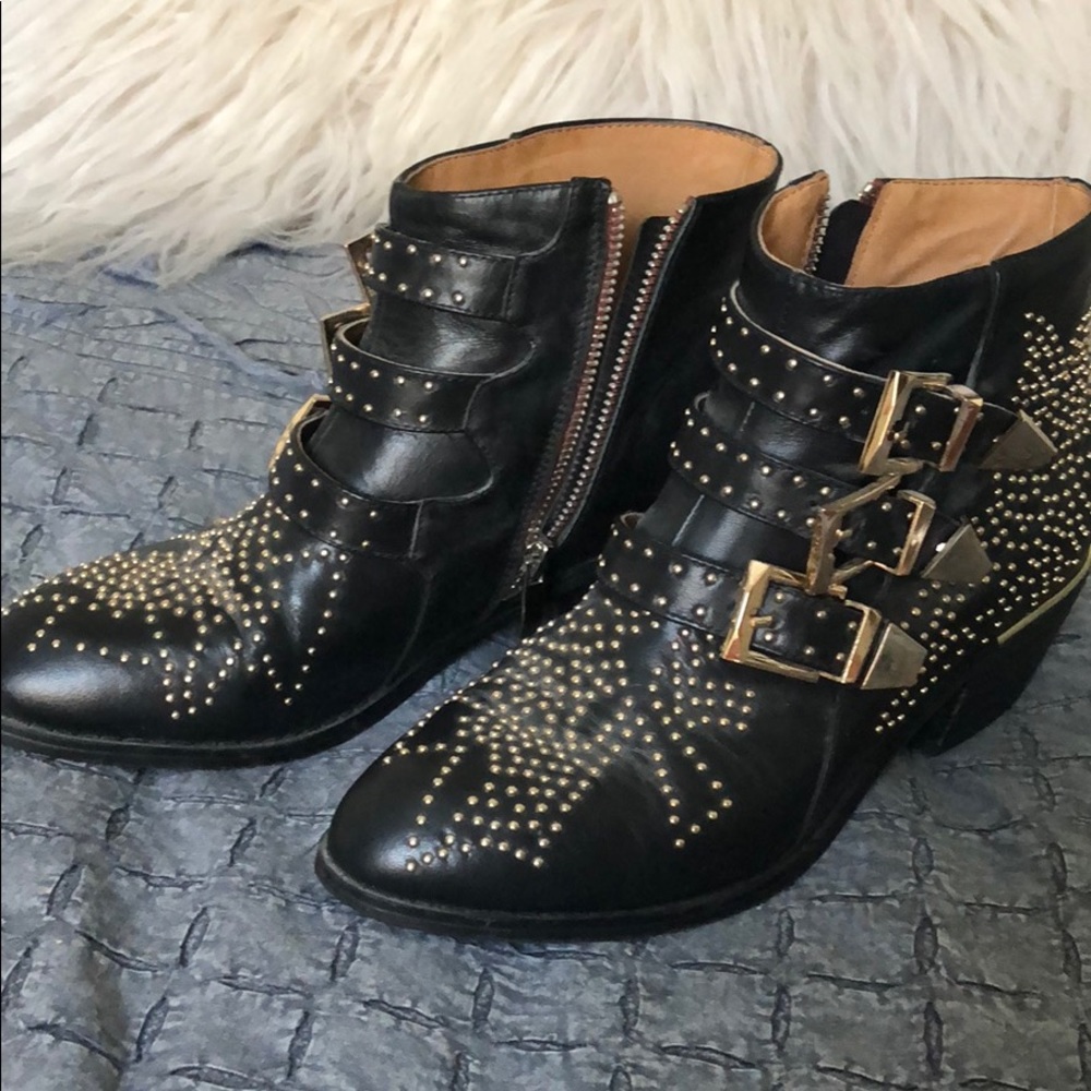 Black booties with gold studs